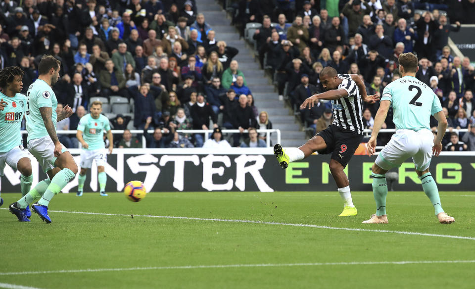 Newcastle United's Salomon Rondon scores his side's first goal of the game during the English Premier League soccer match between Newcastle United and AFC Bournemouth at St James Park stadium, Newcastle, England. Saturday Nov. 10 2018 (Owen Humphreys/PA via AP)