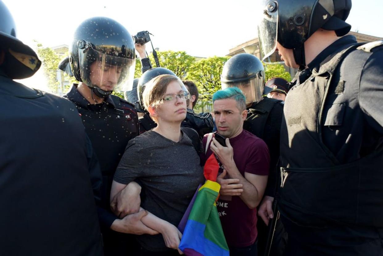 Russian riot police detain gay rights activists during World Day Against Homophobia and Transphobia in St. Petersburg in 2019. <a href="https://www.gettyimages.com/detail/news-photo/russian-riot-police-detained-gay-rights-activist-during-news-photo/1144257220?adppopup=true" rel="nofollow noopener" target="_blank" data-ylk="slk:Olga Maltseva/AFP via Getty Images;elm:context_link;itc:0;sec:content-canvas" class="link ">Olga Maltseva/AFP via Getty Images</a>