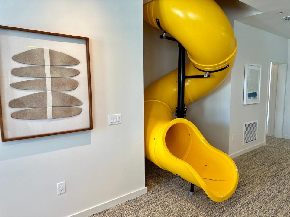Yellow spiral slide in home 