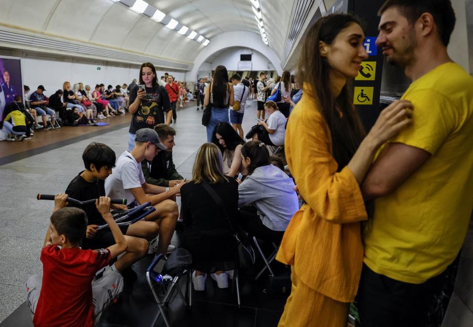 People take cover inside a subway station during an air raid alert, amid Russia's attack on Ukraine, in Kyiv (REUTERS)