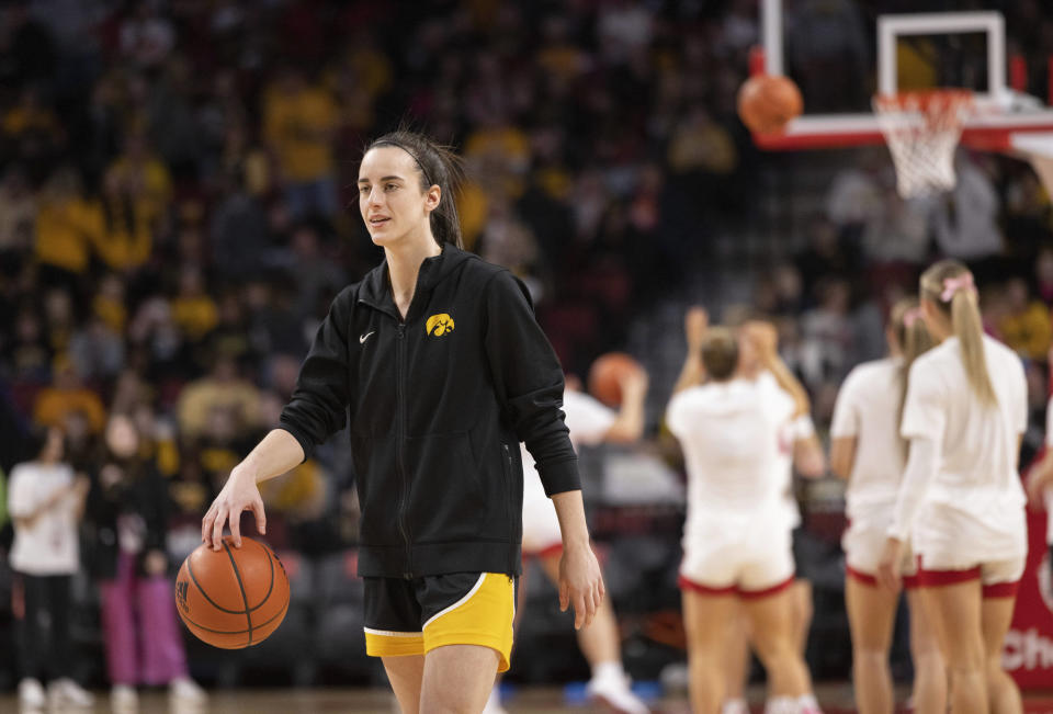 Iowa's Caitlin Clark warms up before playing against Nebraska in an NCAA college basketball game Sunday, Feb. 11, 2024, in Lincoln, Neb. (AP Photo/Rebecca S. Gratz)
