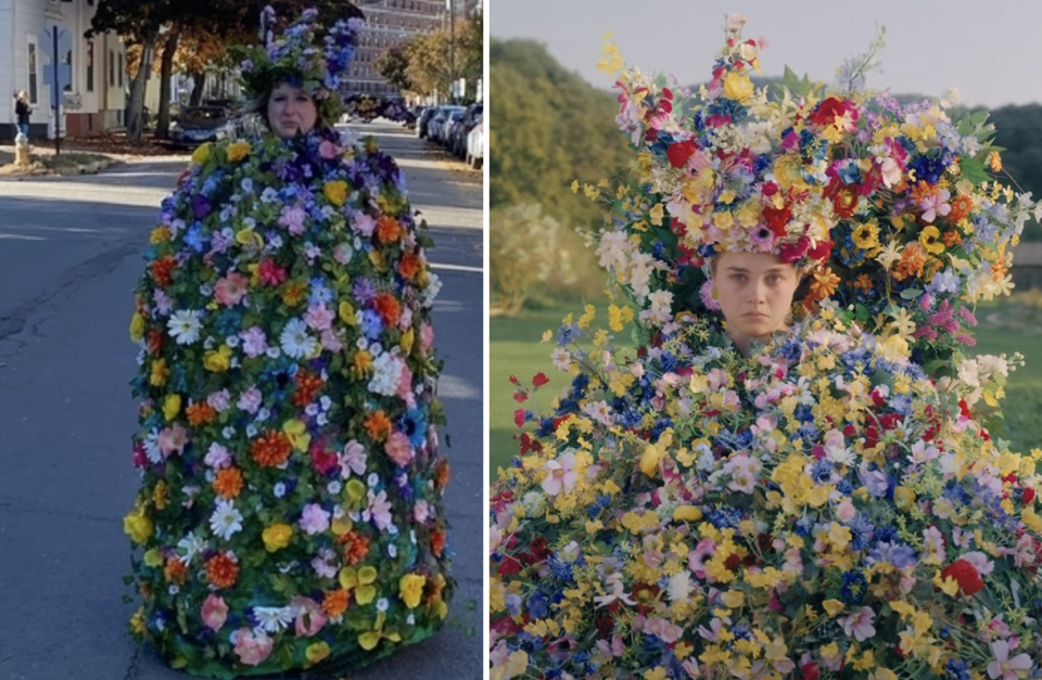 A woman covered in a massive flower dress