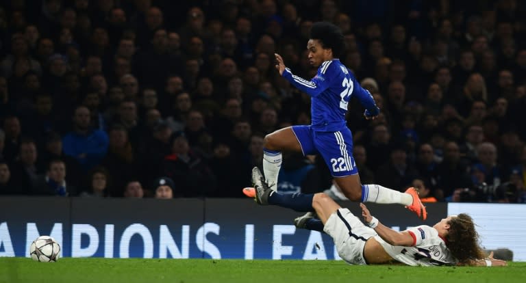 Chelsea's Brazilian midfielder Willian (2R) leaps over a challenge from Paris Saint-Germain's David Luiz during the match at Stamford Bridge on March 9, 2016