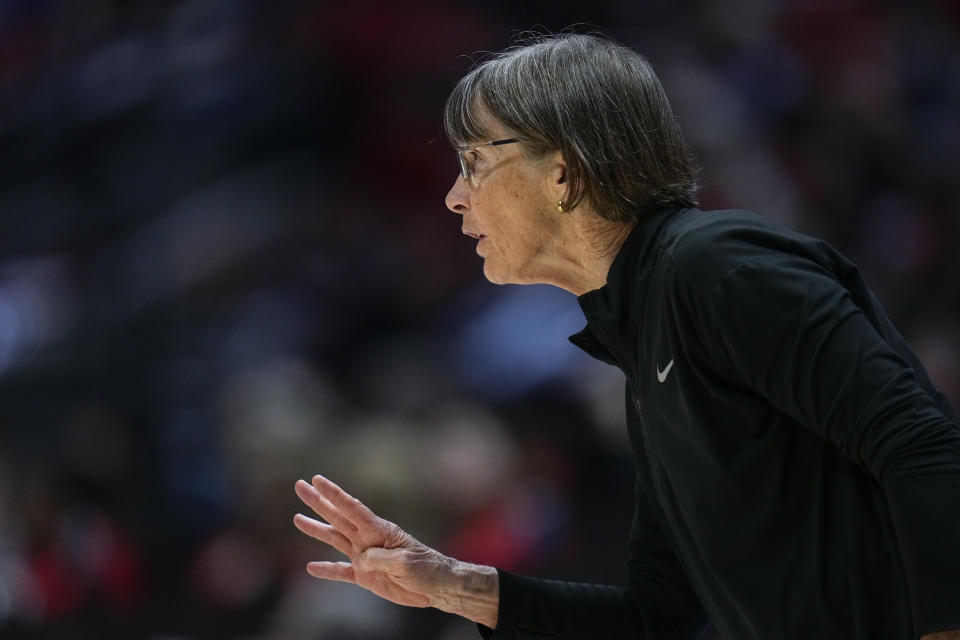 Stanford head coach Tara VanDerveer gestures towards players during the second half of an NCAA college basketball game against San Diego State, Friday, Dec. 1, 2023, in San Diego. (AP Photo/Gregory Bull)