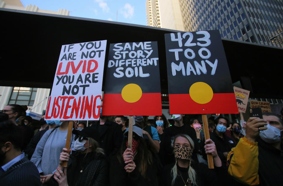 SYDNEY, AUSTRALIA - JUNE 6: Protesters participate in a protest in Sydney to show solidarity with Black Lives Matter demonstrations in the US, which were sparked by the death of George Floyd and rally to stop Aboriginal deaths in custody after an appeal court's last-minute decision to authorise the public gathering in Australia on June 6, 2020. (Photo by Steven Saphore/Anadolu Agency via Getty Images)