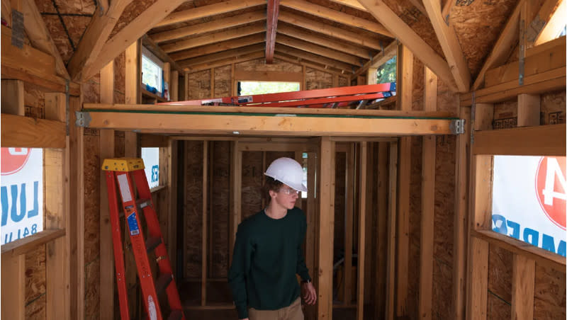 Aspen High School junior Max Sherman constructs a tiny home as part of a woodworking class on the school campus on Sept. 12, 2023, in Aspen, Colo. In John Fisher’s woodworking class, the students learn the skills of building a home from scratch.