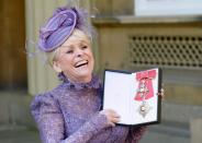 Television star Barbara Windsor after she was made a Dame Commander of the order of the British Empire by Queen Elizabeth II for her services to charity and entertainment during an Investiture ceremony at Buckingham Palace on March 22, 2016 in London, England. (John Stillwell - WPA Pool / Getty Images)
