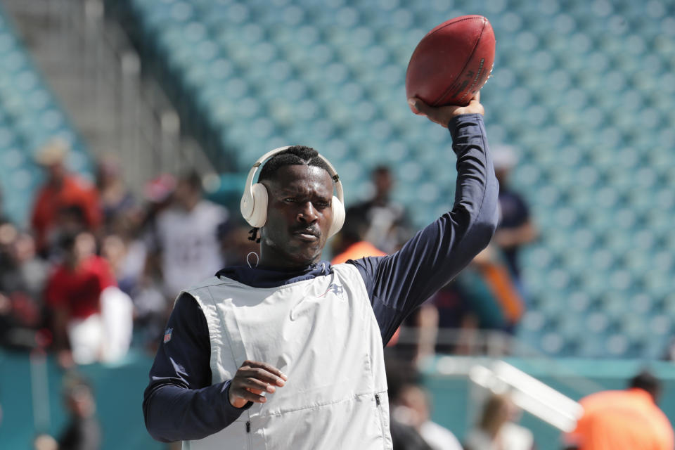 New England Patriots wide receiver Antonio Brown warms up before an NFL football game against the Miami Dolphins, Sunday, Sept. 15, 2019, in Miami Gardens, Fla. (AP Photo/Lynne Sladky)