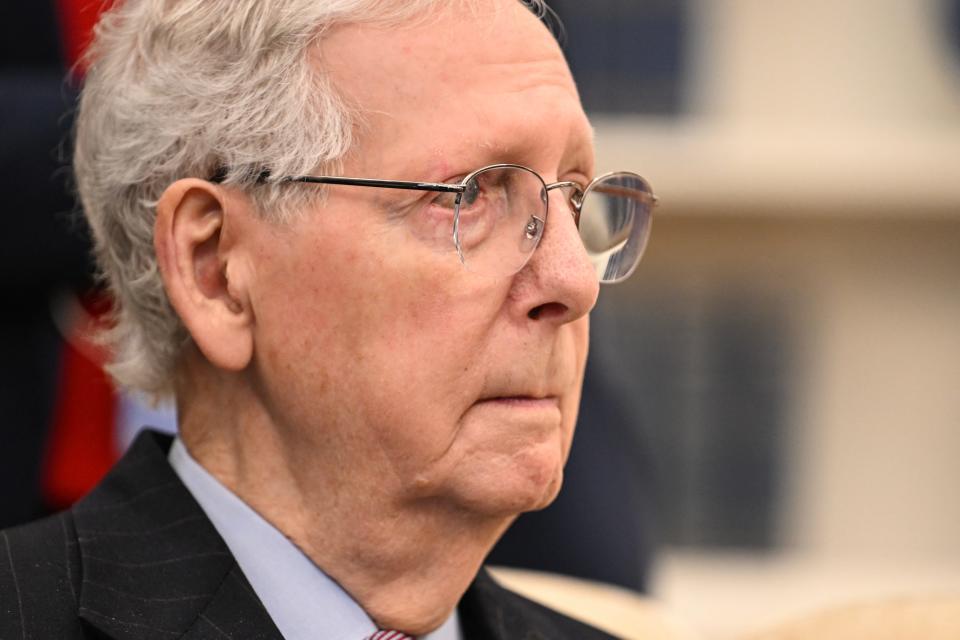 Sen. Mitch McConnell listens during a meeting with President Joe Biden and congressional leadership at the White House on Feb. 27, 2024.