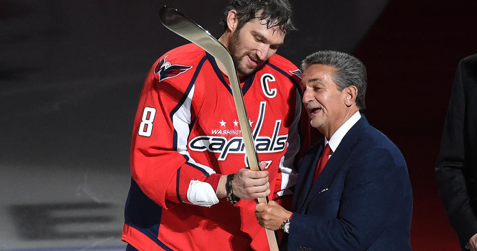 <p>Washington Capitals owner Ted Leonsis presents Alex Ovechkin (8) with a commemorative stick celebrating his 500th goal on January 14, 2016 in Washington, DC. (Jonathan Newton / The Washington Post via Getty Images) </p>