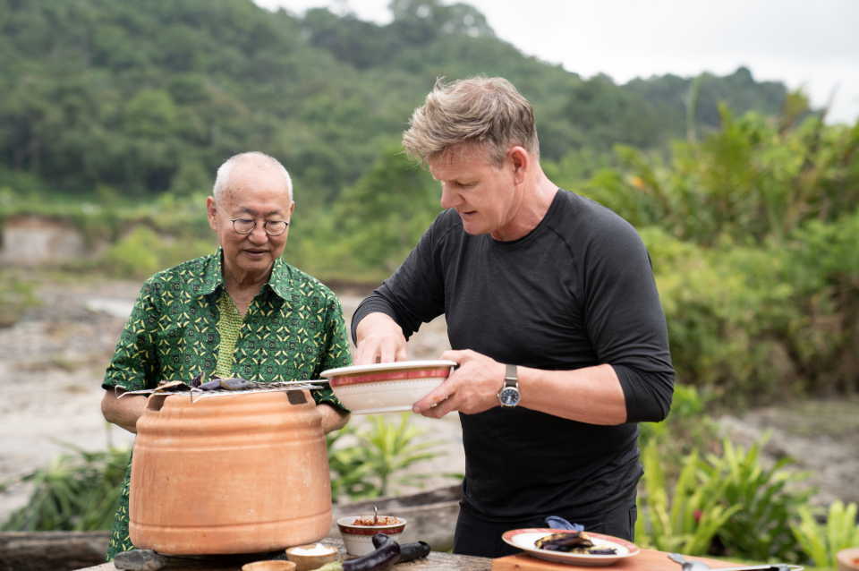 With Wongso looking over his shoulder, the pressure is on for Ramsay to get his rendang right. — Picture courtesy of National Geographic