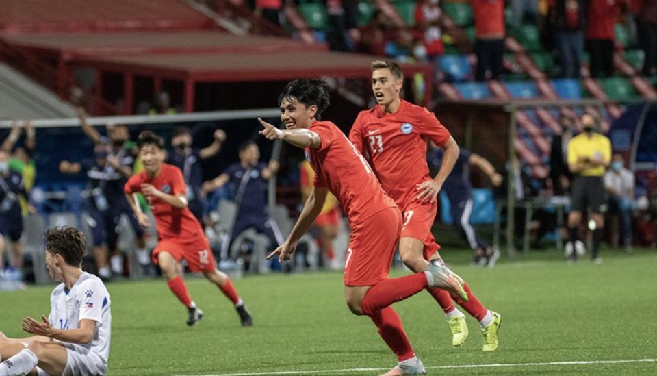 Singapore U-22 striker Glenn Kweh (centre) celebrates after scoring the winner in their AFC U-23 Asian Cup qualifying tie against the Philippines. (PHOTO: Football Association of Singapore)