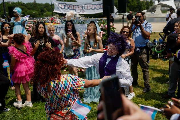 Simon Garbett, 17, who hails from Little Rock, Arkansas, dances with his mom Lizz Garbett during the Trans Youth Prom on May 22 in Washington, D.C. 