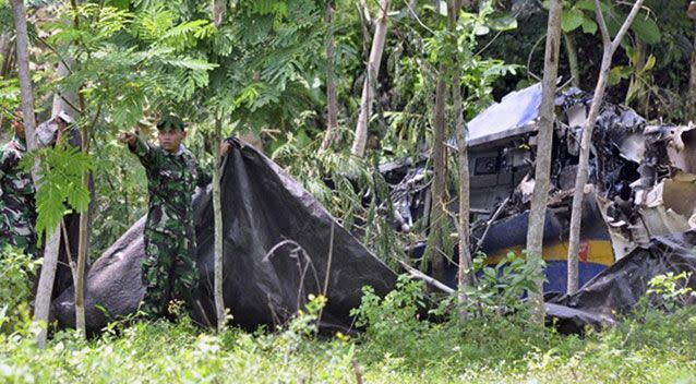 The pilot and co-pilot - both Indonesians - died instantly, but no one on the ground was injured. Source: AP.