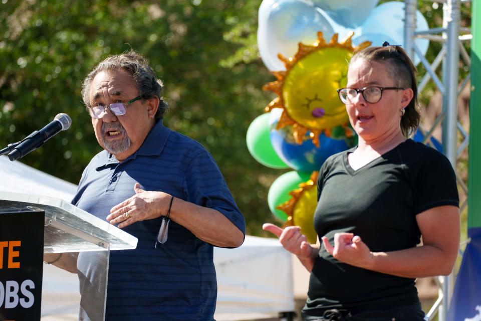 Congressman Raúl Grijalva, left, speaks as Haley Ritter, right, interprets with sign language at the Earth Day rally held by the Climate Action Campaign on the state Capitol Senate lawn on April 23, 2022, in Phoenix.