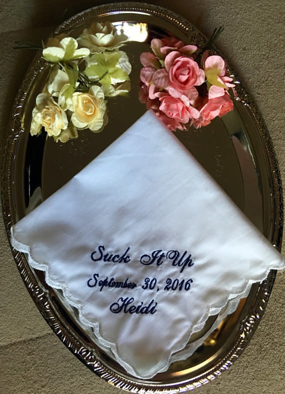 <i>Buy it from <a href="https://www.etsy.com/listing/467161727/suck-it-up-wedding-handkerchief-by?ref=related-2" target="_blank">WeddingTokens on Etsy</a> for $6.</i>