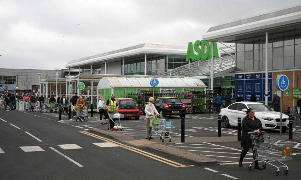 Shoppers queueing at an Asda in Gateshead.