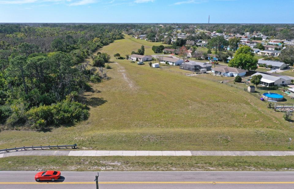 An aerial view of the empty area across the street from North Port's Canine Club located at 6442 Appomattox Dr, in North Port, will be transformed back to its natural habitat.