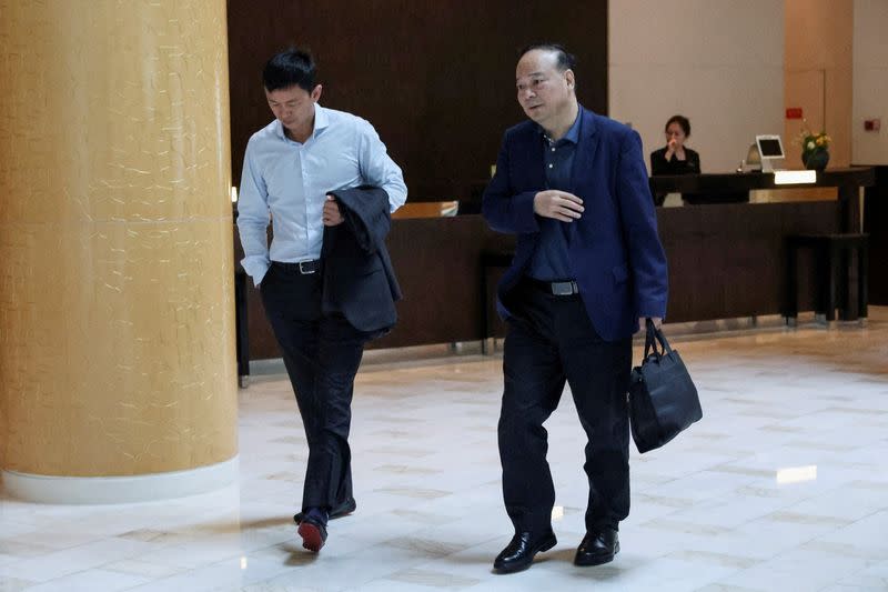 FILE PHOTO: CATL boss visits Elon Musk's Beijing hotel on Tesla CEO's surprise trip