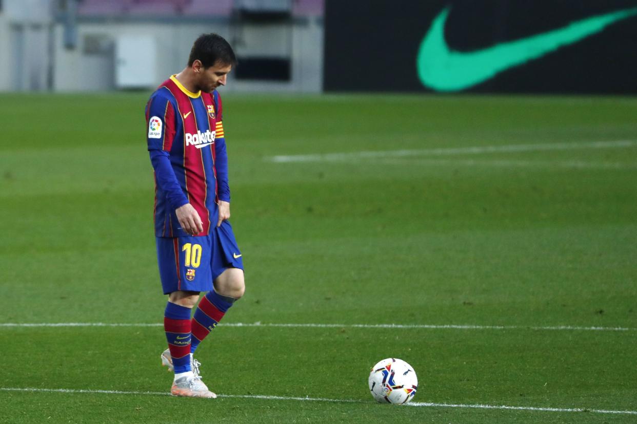 FILE - In this file photo dated Thursday, April 29, Barcelona's Lionel Messi reacts during the Spanish La Liga match against Granada at the Camp Nou stadium in Barcelona, Spain. 