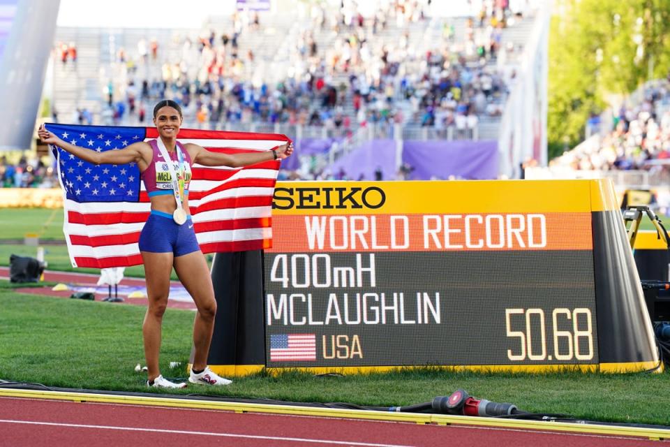 The USA’s Sydney McLaughlin celebrates gold and a new world record. (Martin Rickett/PA) (PA Wire)