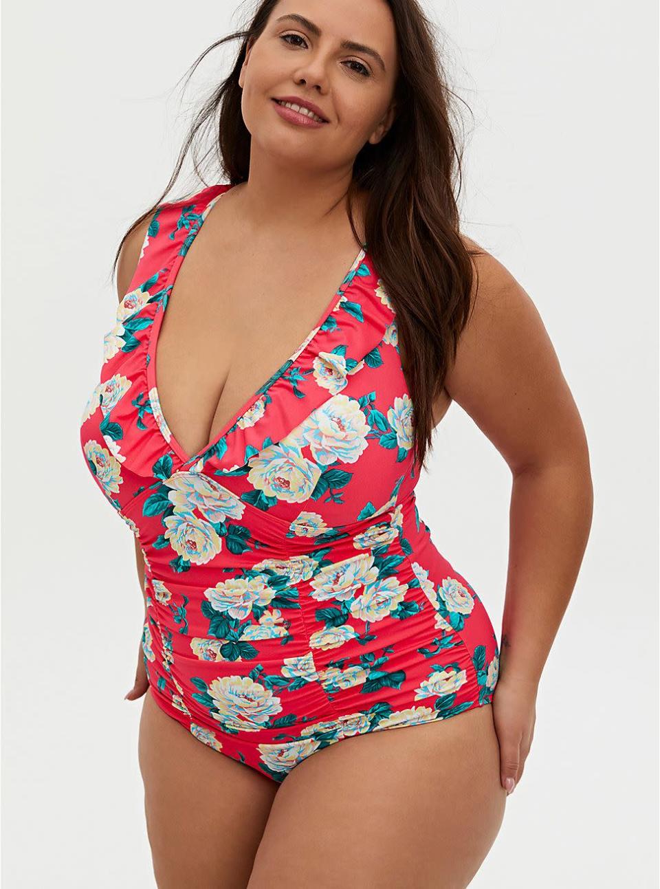 <p><strong>Torrid</strong></p><p>torrid.com</p><p><strong>$64.67</strong></p><p><a href="https://go.redirectingat.com?id=74968X1596630&url=https%3A%2F%2Fwww.torrid.com%2Fproduct%2Fcoral-floral-wireless-ruffle-one-piece-swimsuit%2F12863235.html&sref=https%3A%2F%2Fwww.prevention.com%2Fbeauty%2Fstyle%2Fg32314827%2Fbest-plus-size-bathing-suits%2F" rel="nofollow noopener" target="_blank" data-ylk="slk:Shop Now" class="link ">Shop Now</a></p><p>There’s nothing like a bright floral print to welcome warm weather. This one-piece features a ruffled trim paired with a plunging V-neck for a balance of cute and sexy. The suit comes with adjustable, multiway straps and wireless cups to help you feel supported, while the ruched front offers a flattering fit. As a bonus, <strong>it even has UPF 30+ sun protection.</strong></p>