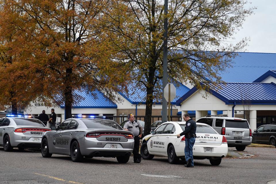 Police respond to a shooting threat at Westside High School on Wednesday, Nov. 30, 2022. Several schools within Georgia received similar threats. 