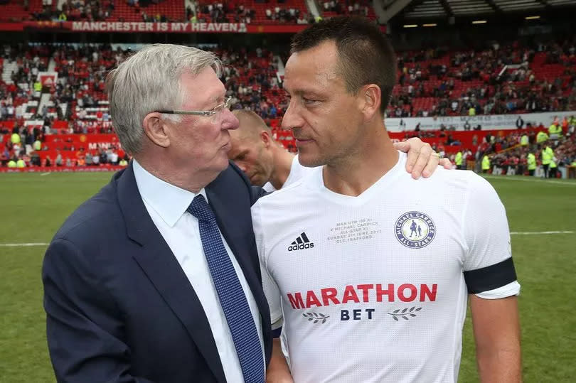 Sir Alex Ferguson and John Terry shake hands at Michael Carrick's testimonial in 2017