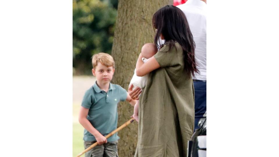 Prince George was seen chatting to aunt Meghan and cousin Archie