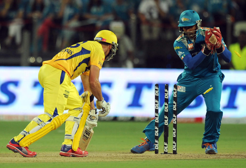 Chennai Super Kings batsman Faf Du Plessis (L) is stumped by Pune Warriors India wicketkeeper Robin Uthappa during the IPL Twenty20 cricket match between Pune Warriors India and Chennai Super Kings at The Subrata Roy Sahara Stadium in Pune on April 14, 2012. RESTRICTED TO EDITORIAL USE. MOBILE USE WITHIN NEWS PACKAGE AFP PHOTO/Indranil MUKHERJEE (Photo credit should read INDRANIL MUKHERJEE/AFP/Getty Images)