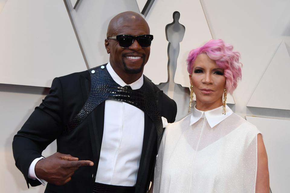 US actor Terry Crews (L) and his wife Rebecca King-Crews arrive for the 91st Annual Academy Awards at the Dolby Theatre in Hollywood, California on February 24, 2019. (Photo by Mark RALSTON / AFP)        (Photo credit should read MARK RALSTON/AFP via Getty Images)