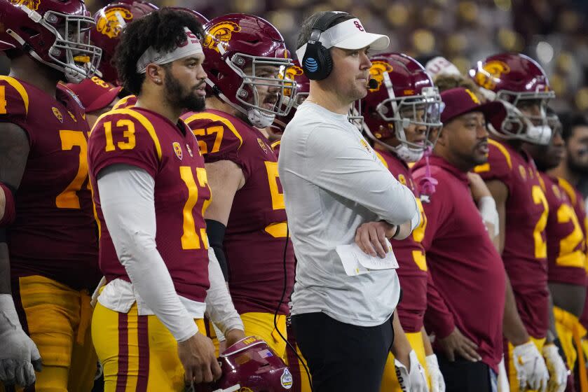 Southern California quarterback Caleb Williams (13) and head coach Lincoln Riley.