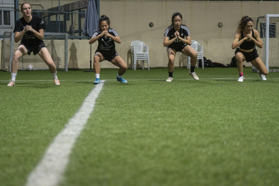 Women's seven-a-side team train in Happy Valley ahead of the Gay Games in Hong Kong, Tuesday, Oct. 31, 2023. Set to launch on Friday, Nov. 3, 2023, the first Gay Games in Asia are fostering hopes for wider LGBTQ+ inclusion in the Asian financial hub. (AP Photo/Chan Long Hei)