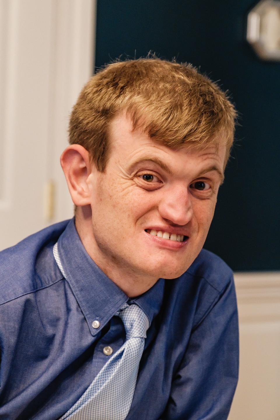 Alec Worth awaits the arrival of Kaylee Arthurs at his New Philadelphia home on Friday. They attended the Night to Shine, a prom for people with special needs, in Canton.