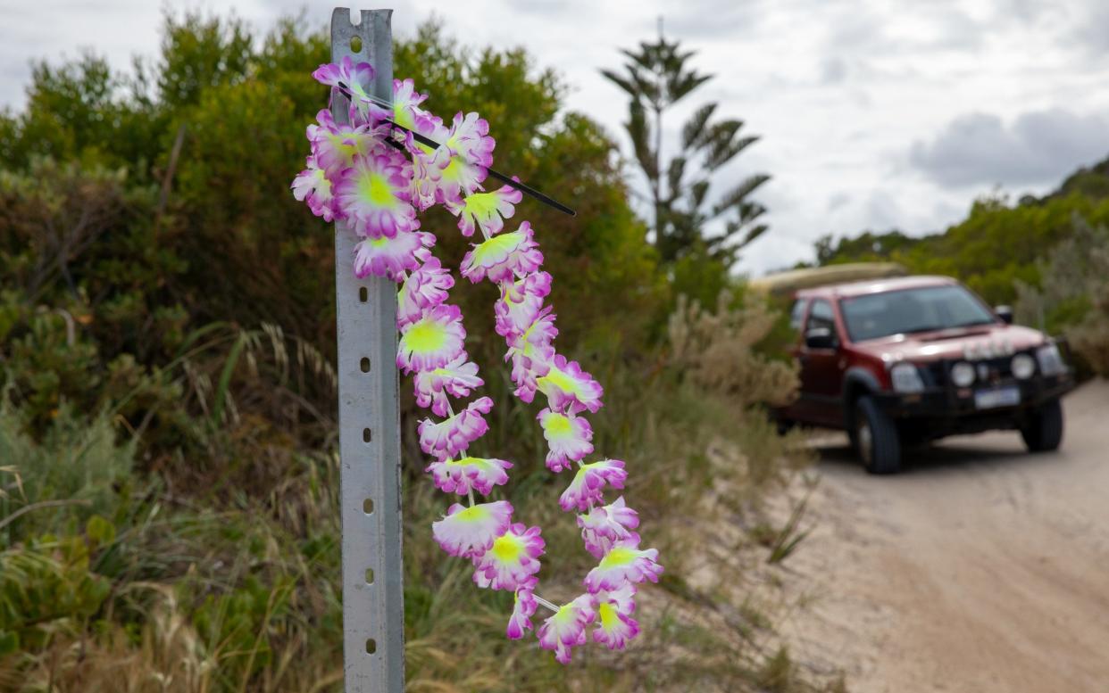 Makeshift memorial to Andrew Sharpe at the entrance to Wylie Bay