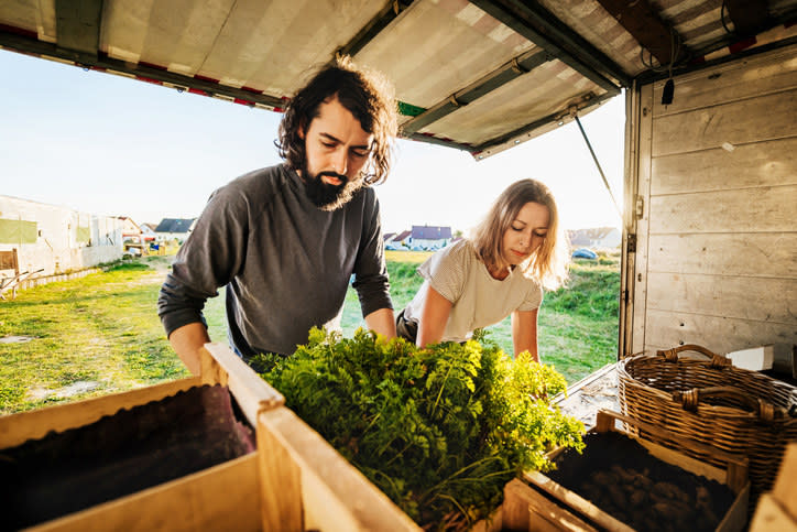 people loading up vegetables