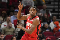 Houston Rockets forward Danuel House Jr. reacts after his dunk during the first half of an NBA basketball game against the Charlotte Hornets, Saturday, Nov. 27, 2021, in Houston. (AP Photo/Eric Christian Smith)