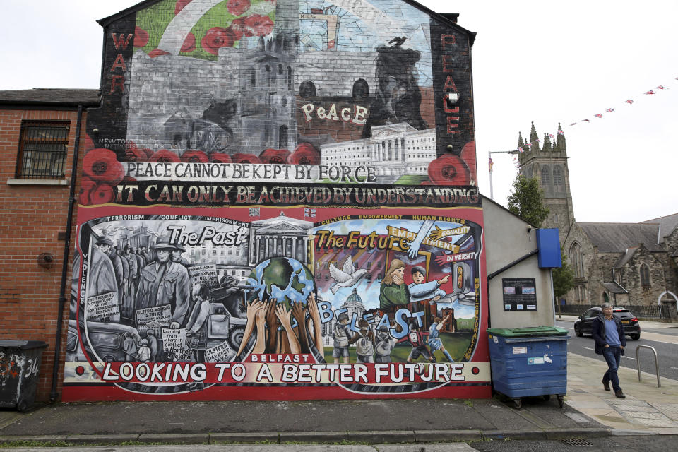 In this Tuesday, Oct. 15, 2019 photo showing a Loyalist mural painted on a wall in east Belfast, Northern Ireland. (AP Photo/Peter Morrison)