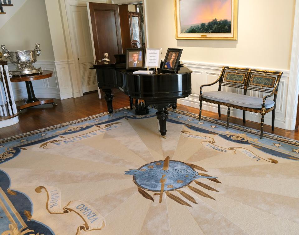First lady Sarah Stitt designed the rug featuring the Osage tribal shield, while former Gov. Brad Henry and then-first lady Kim Henry oversaw the refurbishing of the 1907 Steinway grand piano in the foyer of the Oklahoma Governor's Mansion.