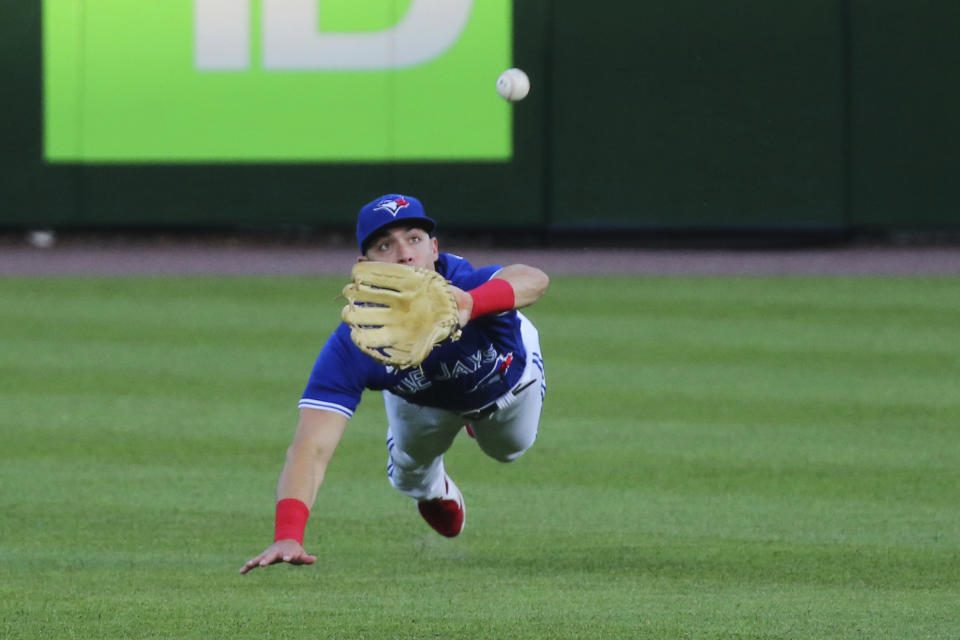 Toronto Blue Jays outfielder Randal Grichuk makes a diving catch for the out on New York Yankees' Dj LaMahieu during the fifth inning of a baseball game Wednesday, June 16, 2021, in Buffalo, N.Y. (AP Photo/Jeffrey T. Barnes)