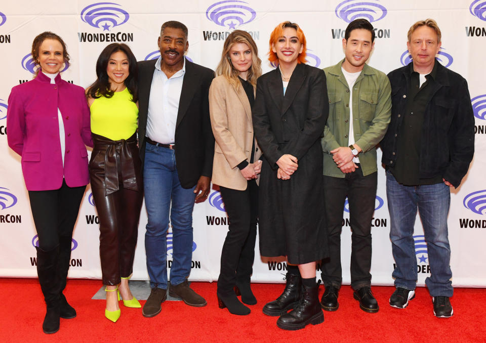 ANAHEIM, CALIFORNIA - MARCH 25:  (L-R) Deborah Pratt, Nanrisa Lee, Ernie Hudson, Caitlin Bassett, Mason Alexander Park, Raymond Lee and Dean Georgaris attend the 