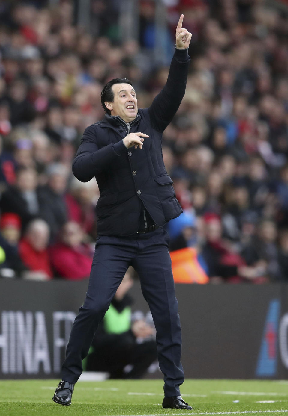Arsenal manager Unai Emery gestures on the touchline during the game against Southampton during the English Premier League soccer match at St Mary's Stadium in Southampton, England, Sunday Dec. 16, 2018. (Adam Davy/PA via AP)