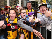 Hawks fans show their support during the 2013 AFL Grand Final Parade on September 27, 2013 in Melbourne, Australia. Photo: GETTY