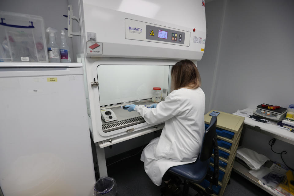 Scientists are seen working at Cobra Biologics, they are working on a potential vaccine for COVID-19, following the outbreak of the coronavirus disease (COVID-19), in Keele, Britain, April 30, 2020.  REUTERS/Carl Recine