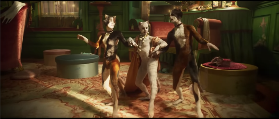 Three cast members of "Cats" during a number