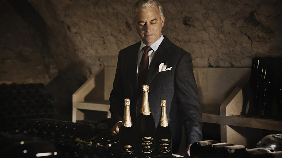 The Champagne house’s CEO and president Gilles de Larouzière Henriot with Les Mémoires collection. - Credit: Henriot