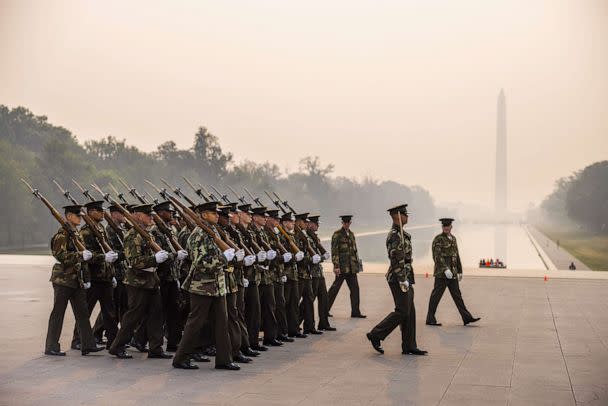 PHOTO: Members of the Marine Corps practice for an up-coming parade under skies made hazy from Canadian wildfires near the Lincoln Memorial in Washington, D.C., June 8, 2023. (Jim Lo Scalzo/EPA via Shutterstock)