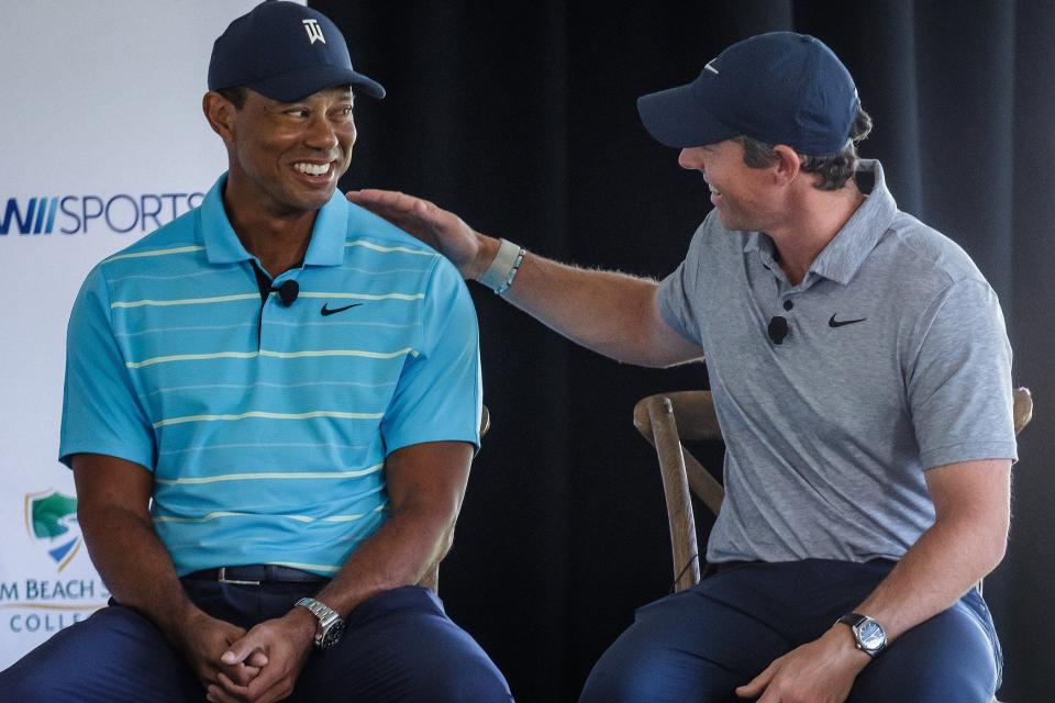 Tiger Woods and Rory McIlroy talk with Erin Andrews during a morning media event before groundbreaking ceremony at Palm Beach State College in Palm Beach Gardens, Fla., on February 20, 2023. It will be the future site of TGL, a new golf league played in a stadium and launched in partnership with the PGA.