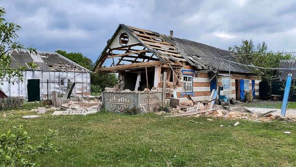 PHOTO: This handout photo released by Belgorod region governor Vyacheslav Gladkov's telegram channel on May 23, 2023, shows damaged houses in Russia's western Belgorod region, May 23, 2023. (AP)