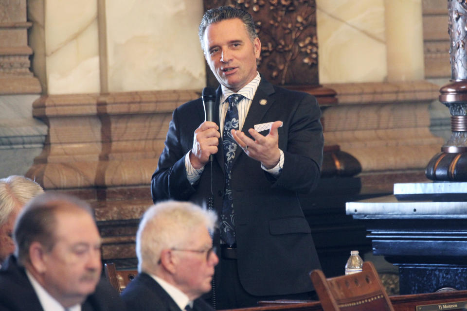 Kansas Senate President Ty Masterson, R-Andover, speaks in favor of a bill cutting Kansas income, sales and property taxes by $1.4 billion over the next three years, Thursday, April 4, 2024, at the Statehouse in Topeka, Kan. GOP legislative leaders brokered a deal on tax cuts with Democratic Gov. Laura Kelly. (AP Photo/John Hanna)